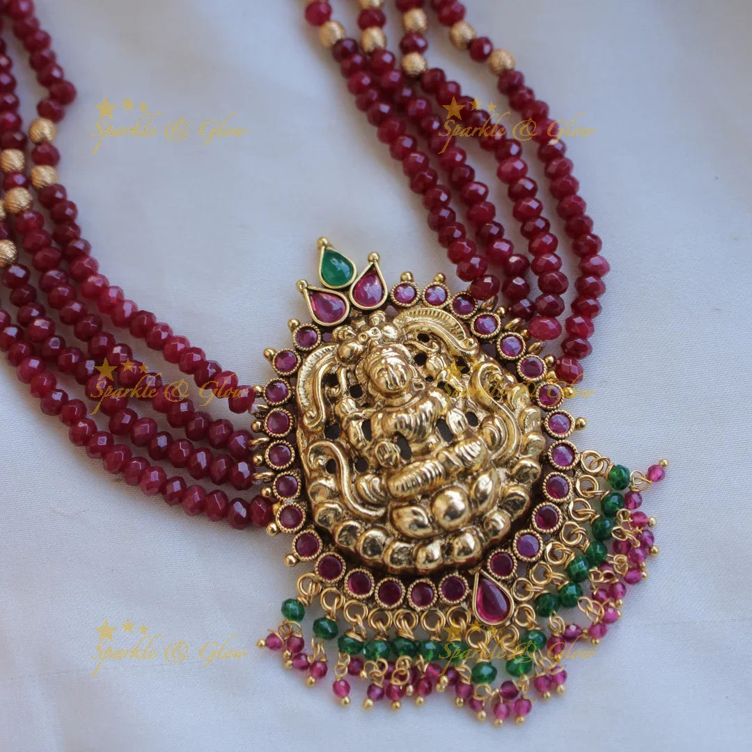 Elegant Lakshmi carved choker with multi layer beads ruby and pearls - maroon - Sparkle and Glow