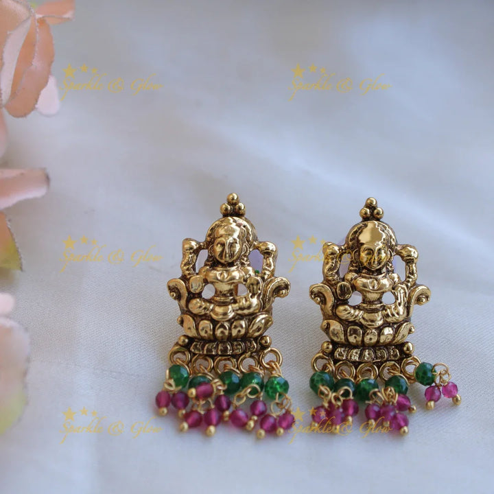 Elegant Lakshmi carved choker with multi layer beads ruby and pearls - maroon - Sparkle and Glow