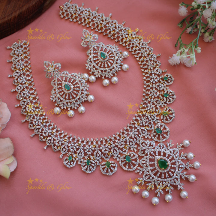 Glittering Floral design American diamond short necklace with emerald and pearls - green