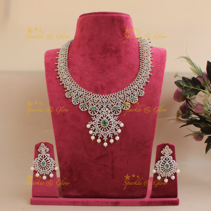 Glittering Floral design American diamond short necklace with emerald and pearls - green