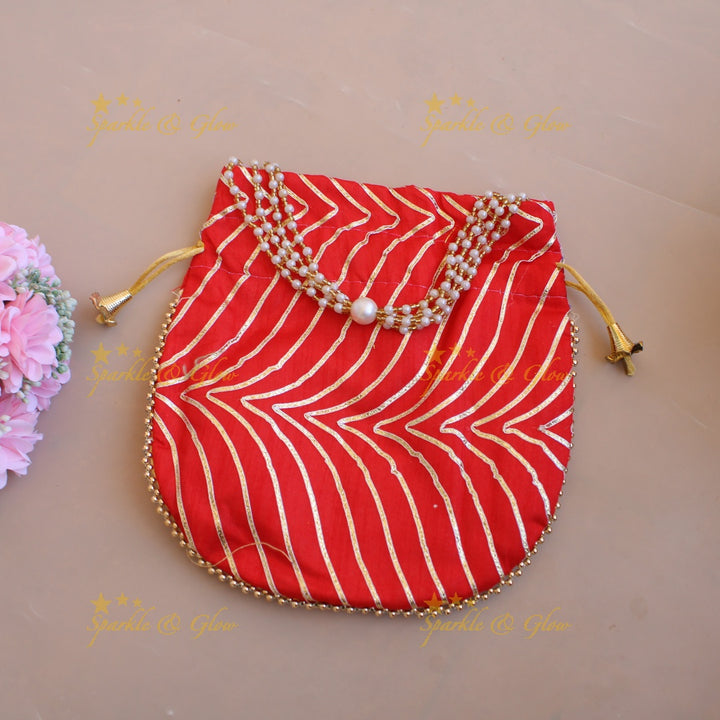 Golden work 8.5*8 inch potli bags with gold beads and pearls