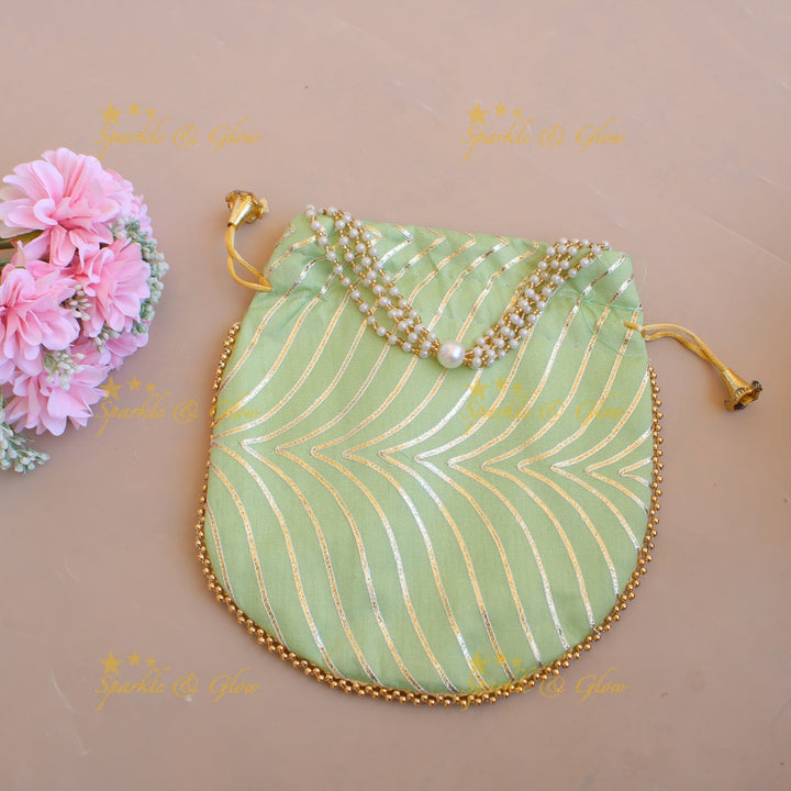 Golden work 8.5*8 inch potli bags with gold beads and pearls