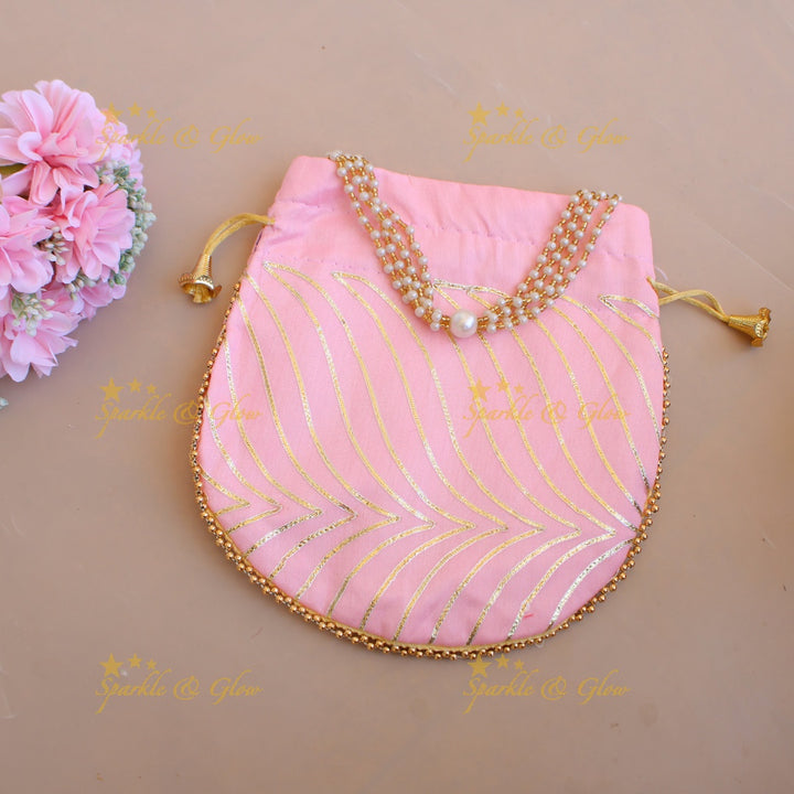 Golden work 8.5*8 inch potli bags with gold beads and pearls