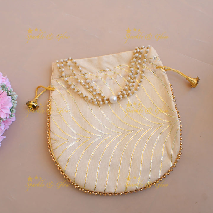 Golden work 8.5*8 inch potli bags with gold beads and pearls