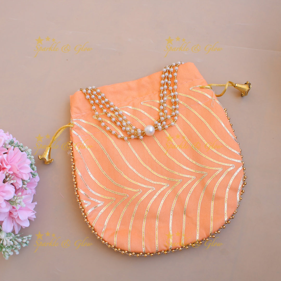 Golden work 8.5*8 inch potli bags with gold beads and pearls