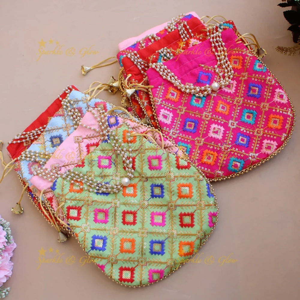 Embroidered 8.5*8 inch potli bags with gold beads and pearl handle - Sparkle and Glow