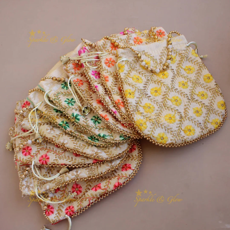 Floral design different colour Embroidered 8.5*8 inch potli bags with pearls and gold beads - Sparkle and Glow