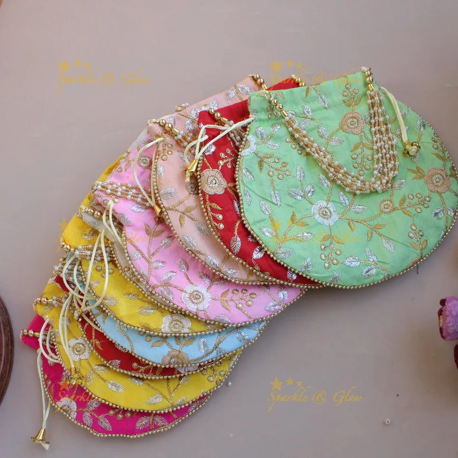 Floral Embroidered pot shape 8.5*8 inch potli bags with gold beads and pearl handle - Sparkle and Glow