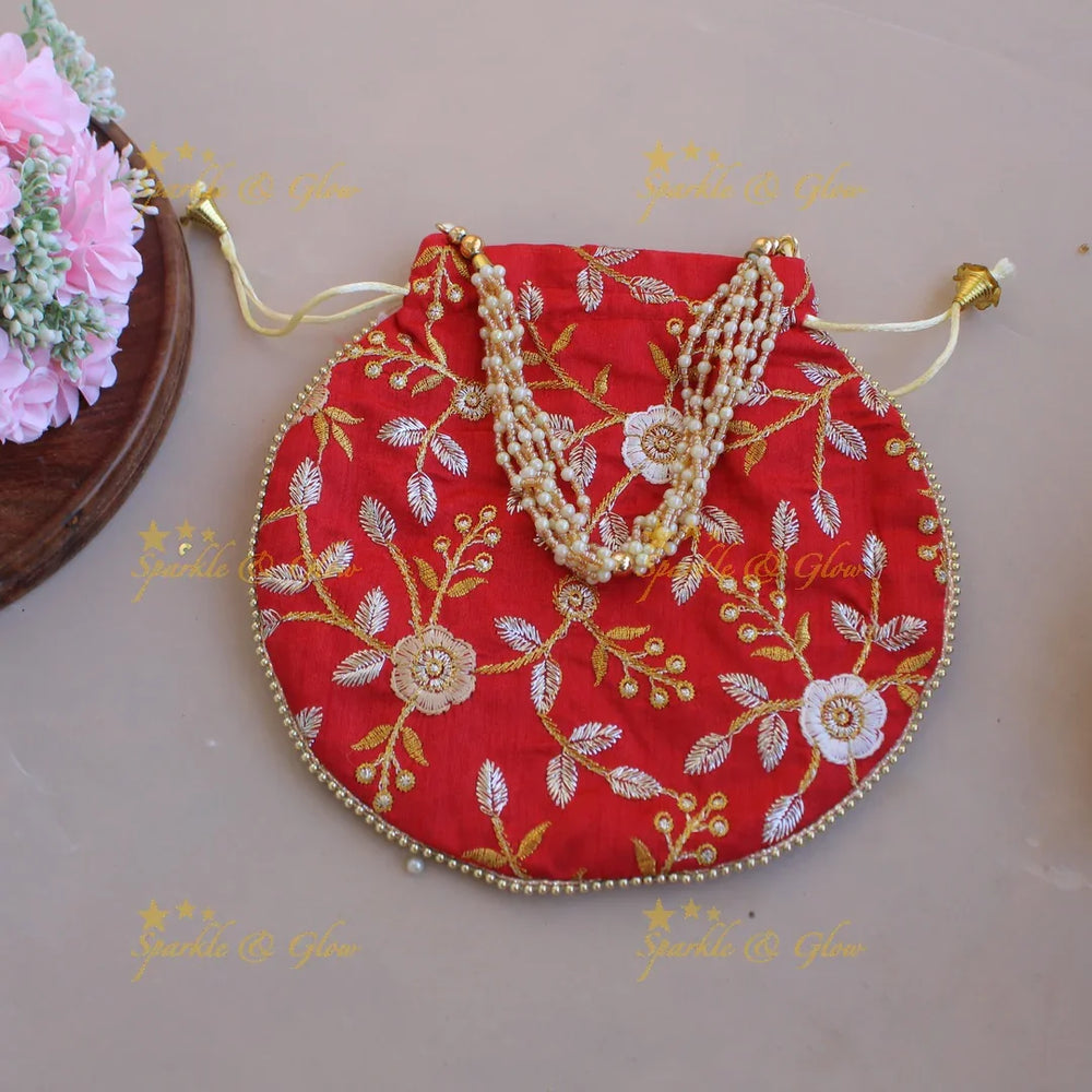 Floral Embroidered pot shape 8.5*8 inch potli bags with gold beads and pearl handle - Sparkle and Glow