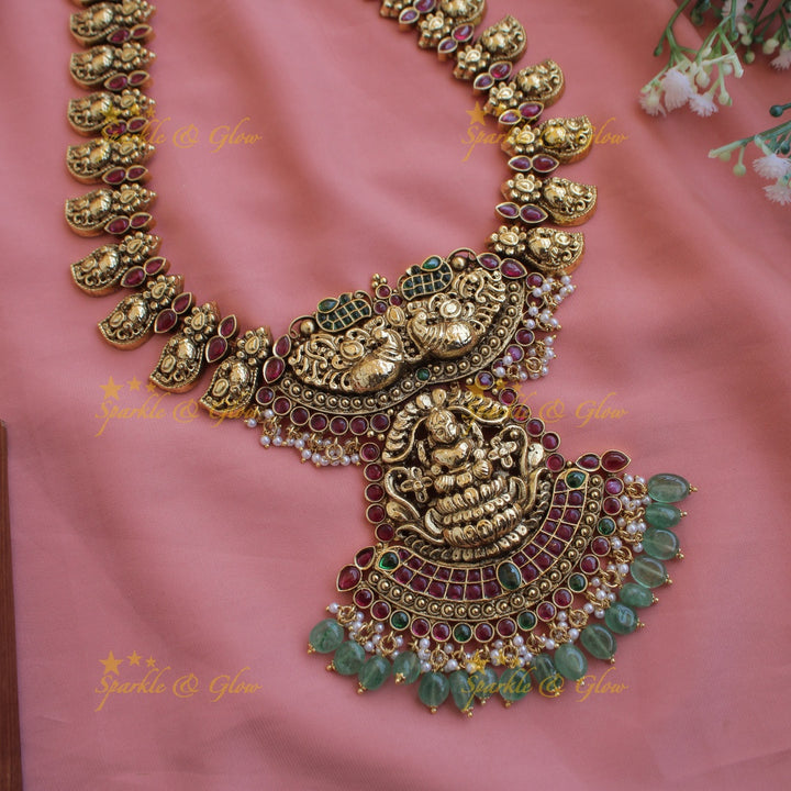 Statement Lakshmi peacock carved mango kemp stone long necklace with mint green beads