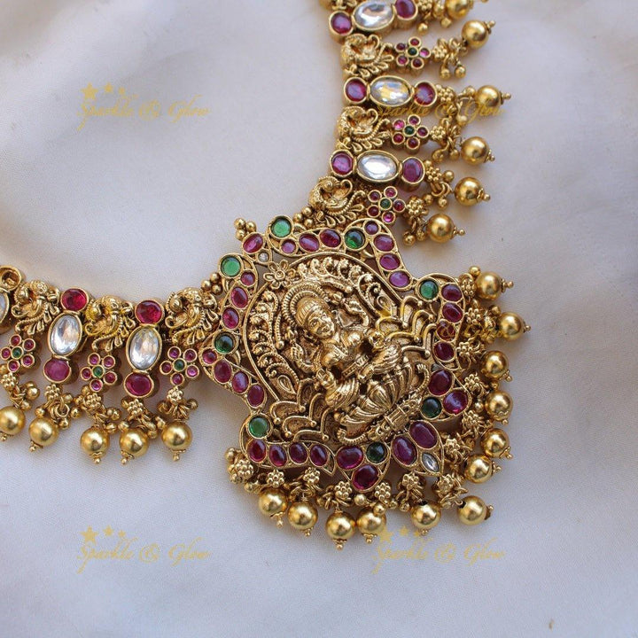 Grand intricate Lakshmi peacock carved kemp stone short necklace with gold beads - Sparkle and Glow