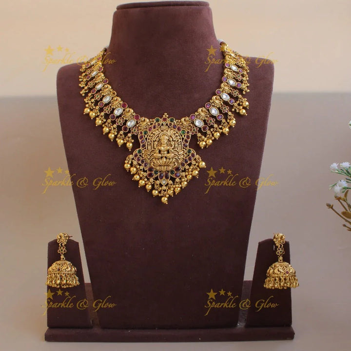 Grand intricate Lakshmi peacock carved kemp stone short necklace with gold beads - Sparkle and Glow