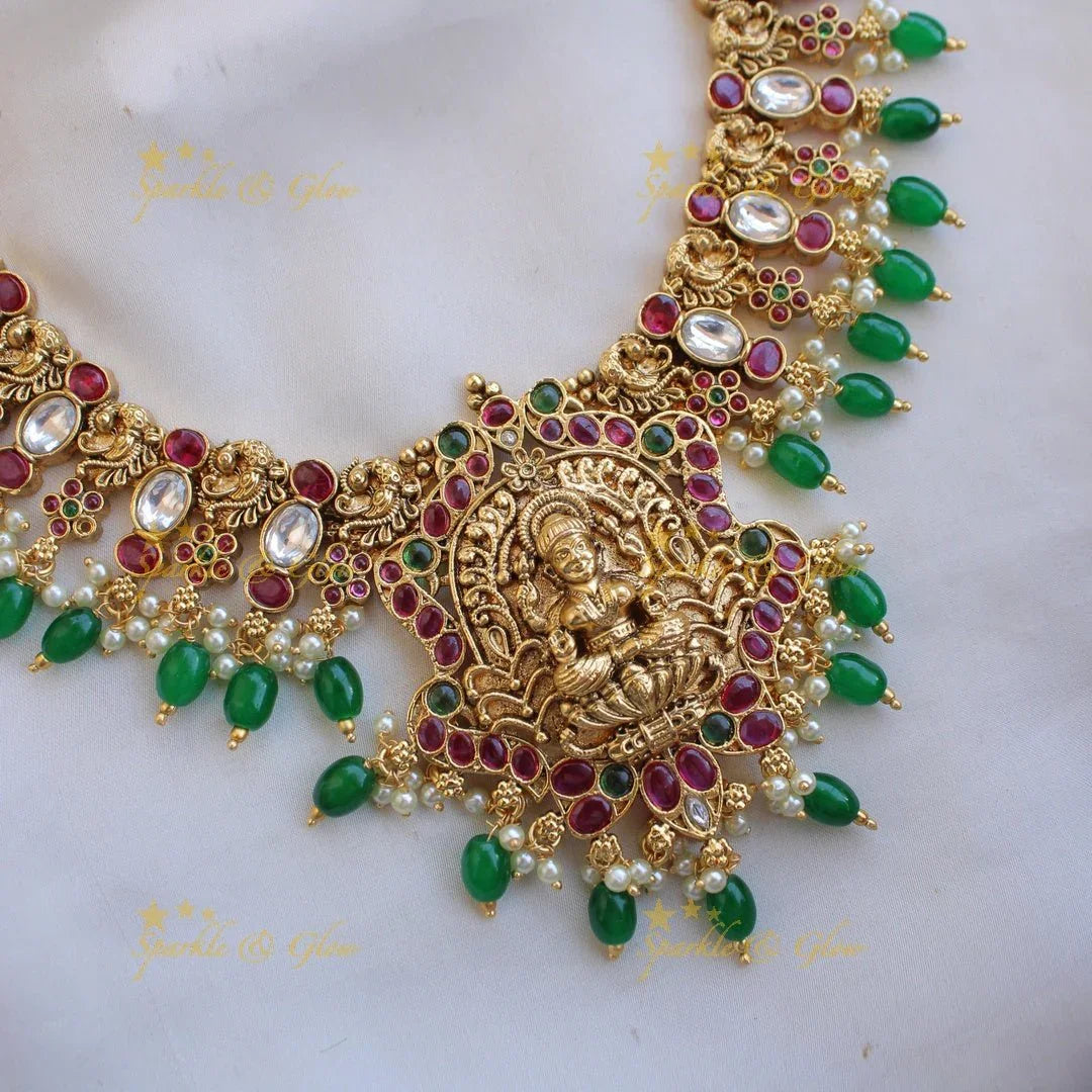 Grand intricate Lakshmi peacock carved kemp stone short necklace with gold beads - Sparkle and Glow