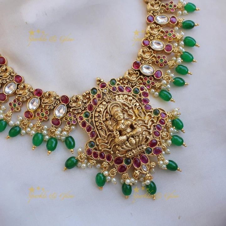Grand intricate Lakshmi peacock carved kemp stone short necklace with gold beads - Sparkle and Glow
