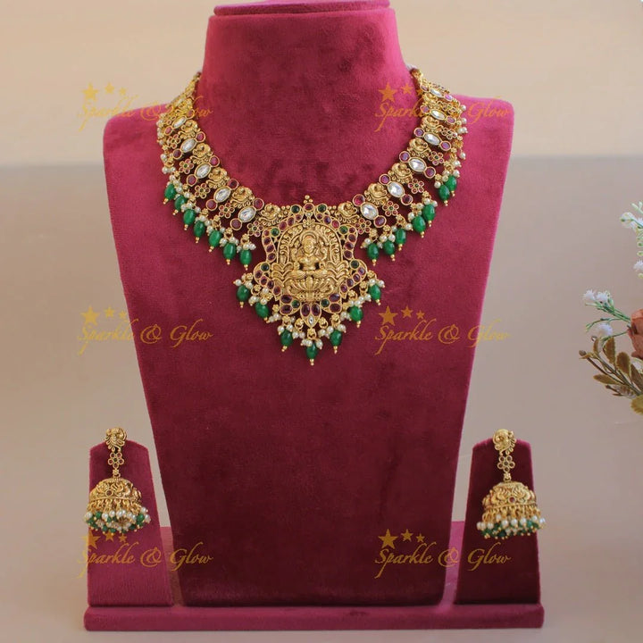 Grand intricate Lakshmi peacock carved kemp stone short necklace with gold beads - Sparkle and Glow