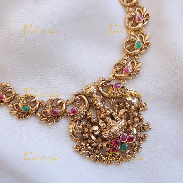 Elegant Lakshmi peacock carved kemp stone short necklace with gold beads and ruby - Sparkle and Glow