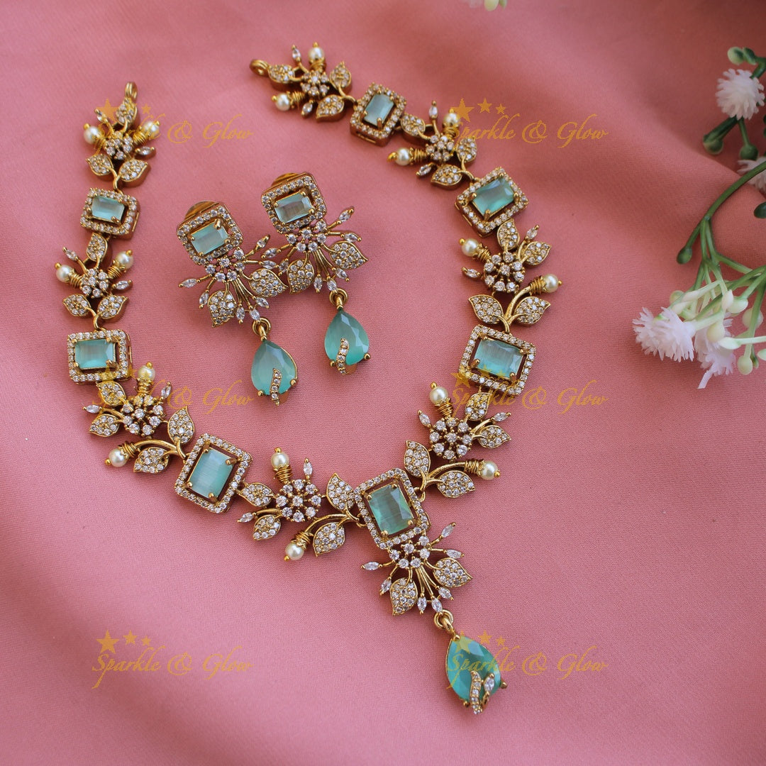 Elegant Floral and leaf design AD short necklace with pearls and stones - Pink Green