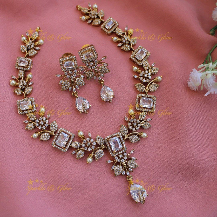 Elegant Floral and leaf design AD short necklace with pearls and ruby stones - pink - Sparkle and Glow