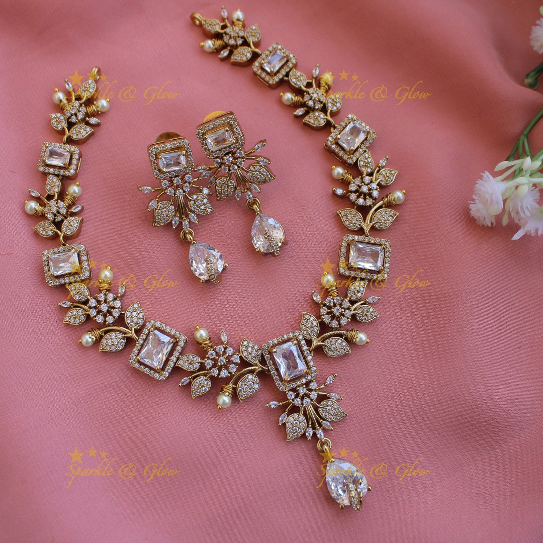 Elegant Floral and leaf design AD short necklace with pearls and stones - Pink Green