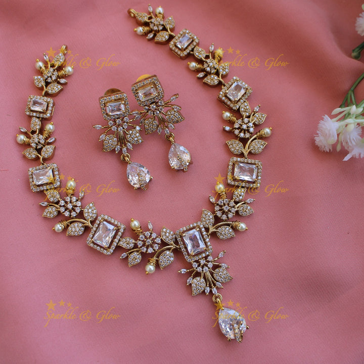 Elegant Floral and leaf design AD short necklace with pearls and stones - Pink Green