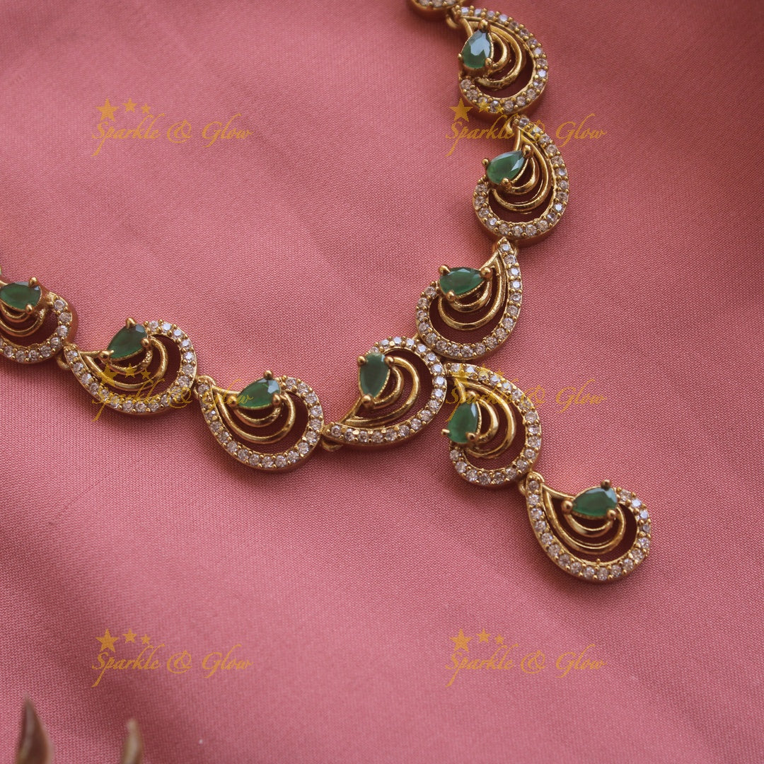 Statement Unique design AD short necklace with emeralds