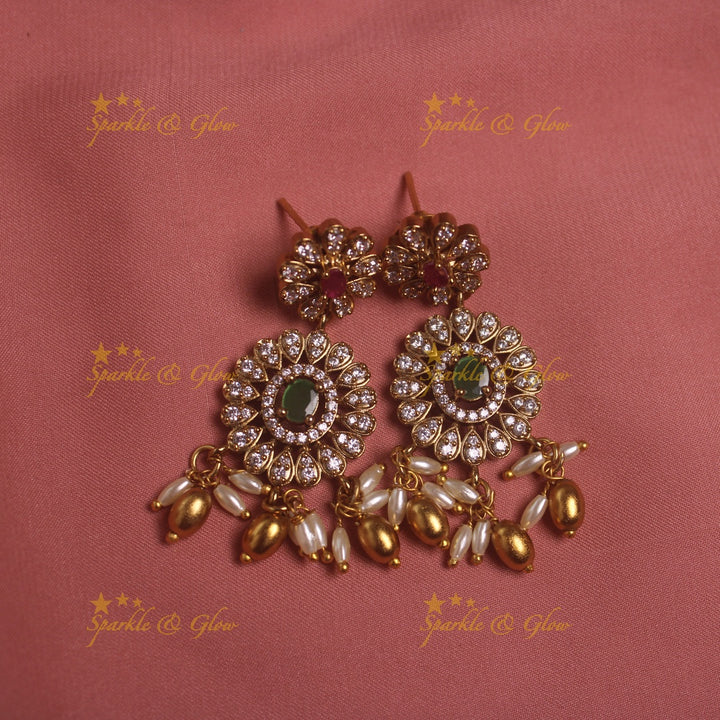 Gorgeous Tribal and floral design AD short necklace with emeralds rice pearls and gold beads
