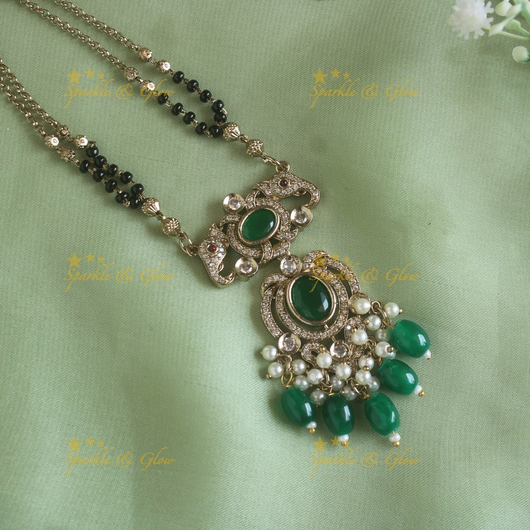 Stunning Elephant floral design pendant black beads necklace, mangalsutra with stone and green beads - Sparkle and Glow - Back Thread - 