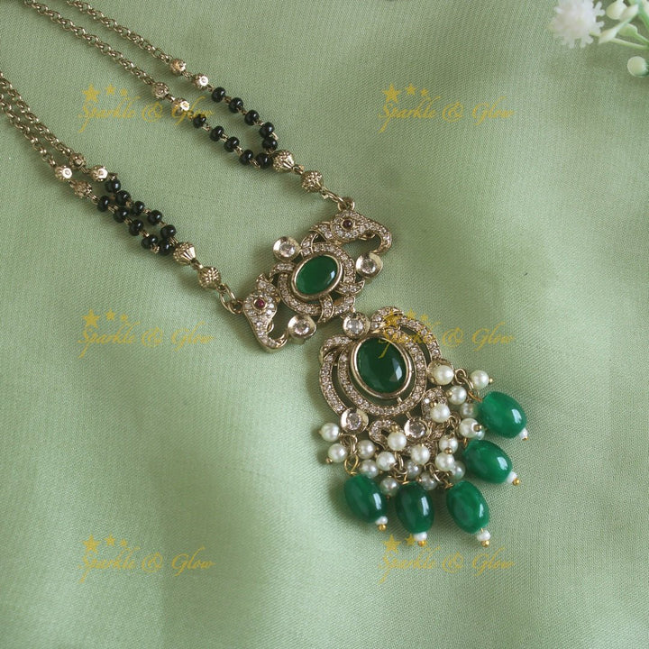 Stunning Elephant floral design pendant black beads necklace, mangalsutra with stone and green beads - Sparkle and Glow - Back Thread - 