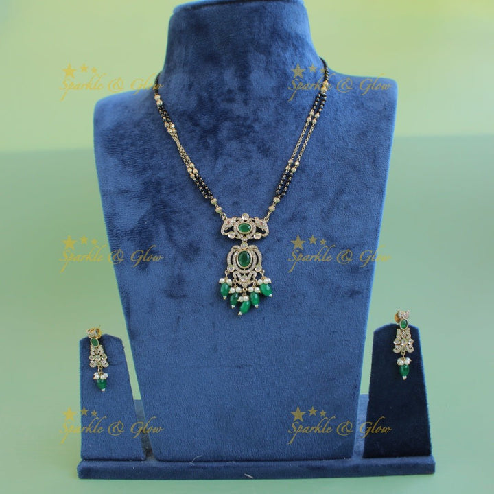 Stunning Elephant floral design pendant black beads necklace, mangalsutra with stone and green beads - Sparkle and Glow - Back Thread - 