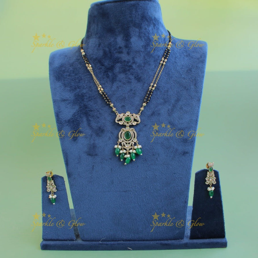 Stunning Elephant floral design pendant black beads necklace, mangalsutra with stone and green beads - Sparkle and Glow - Back Thread - 
