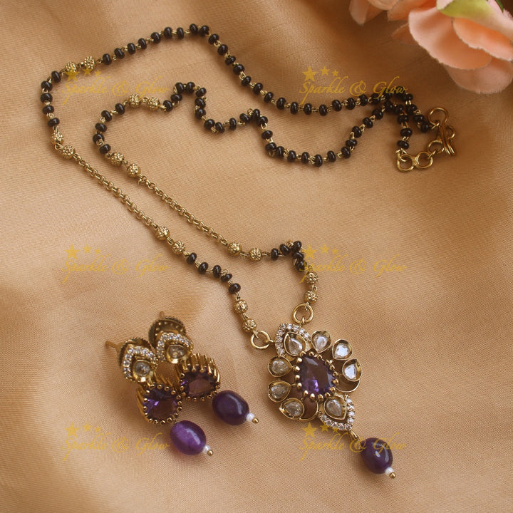 Beautiful Floral design pendant black beads necklace, mangalsutra with Maroon green stones and beads