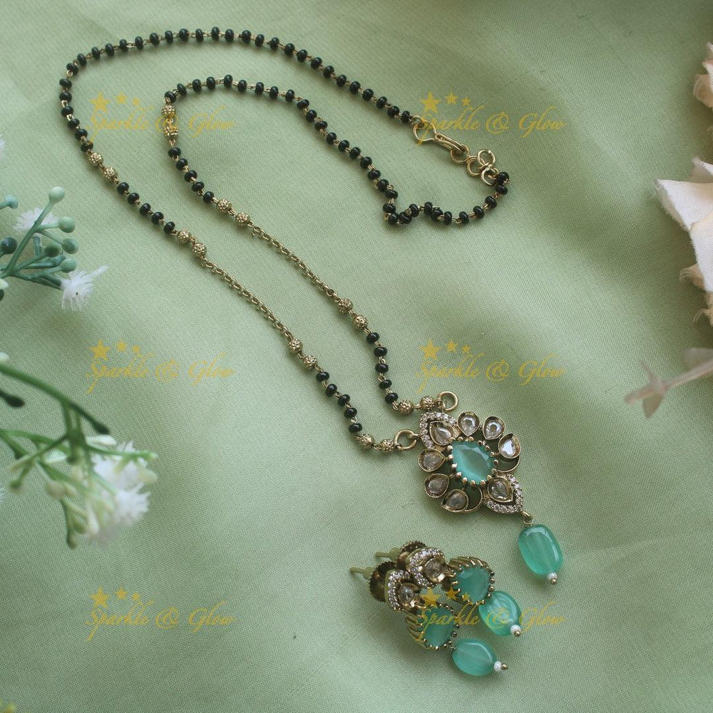 Beautiful Floral design pendant black beads necklace, mangalsutra with maroon beads and stones - Sparkle and Glow