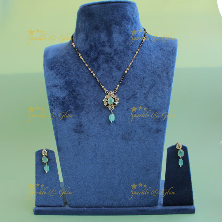 Beautiful Floral design pendant black beads necklace, mangalsutra with mint green beads and stones