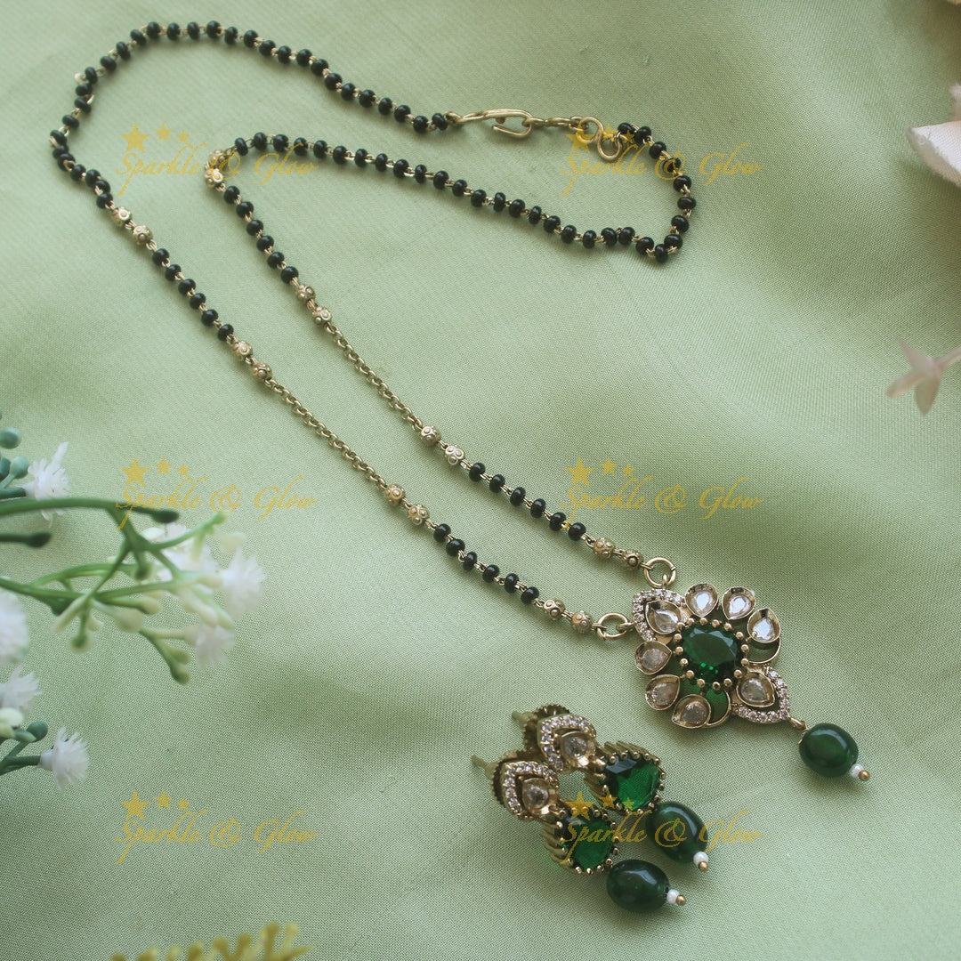 Beautiful Floral design pendant black beads necklace, mangalsutra with mint green beads and stones