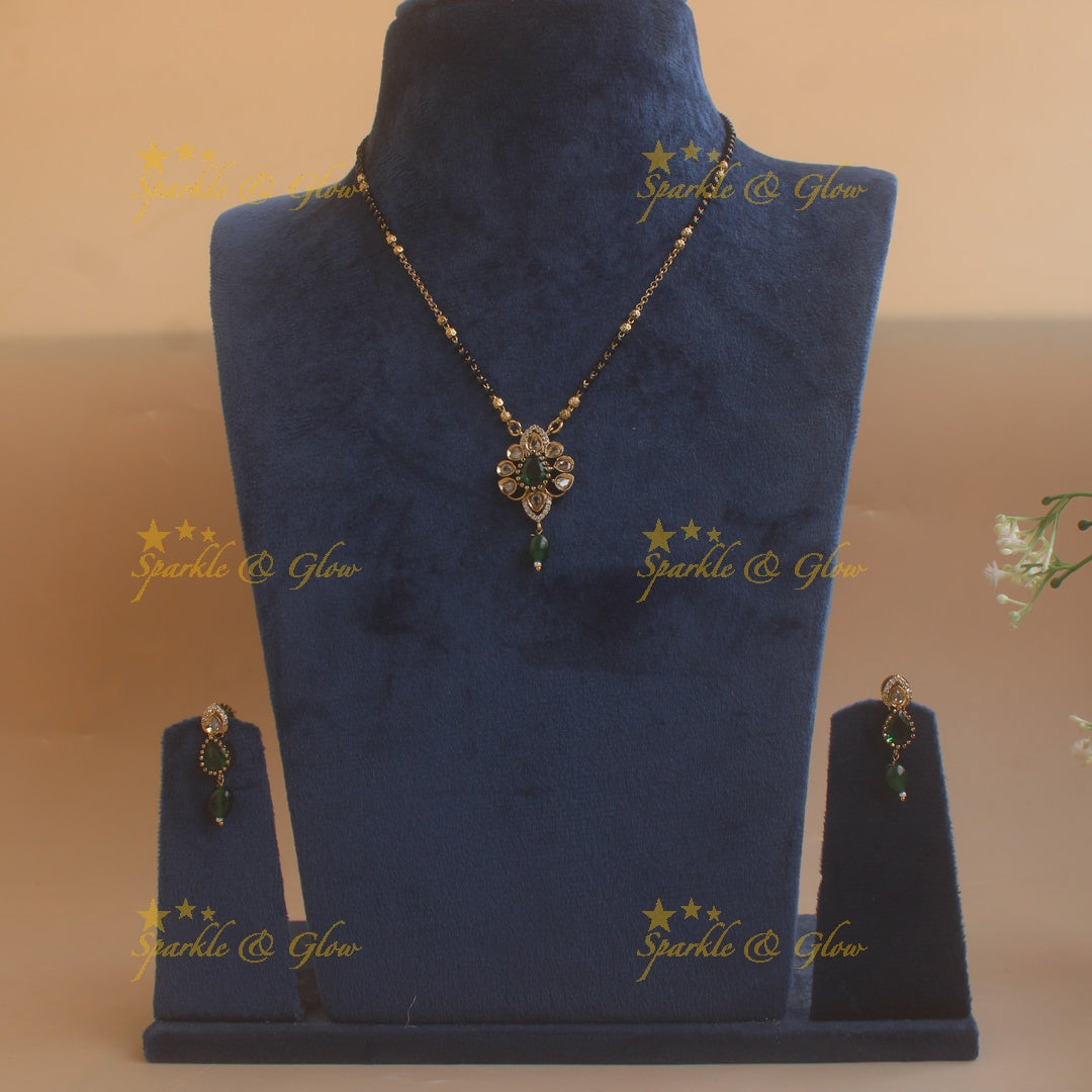 Beautiful Floral design pendant black beads necklace, mangalsutra with green beads and stones