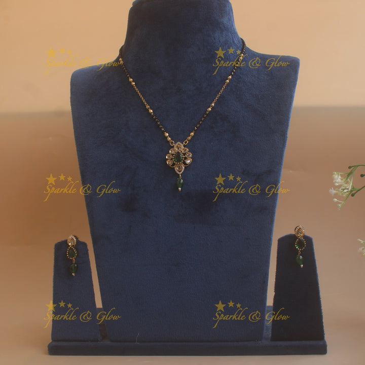 Beautiful Floral design pendant black beads necklace, mangalsutra with green beads and stones