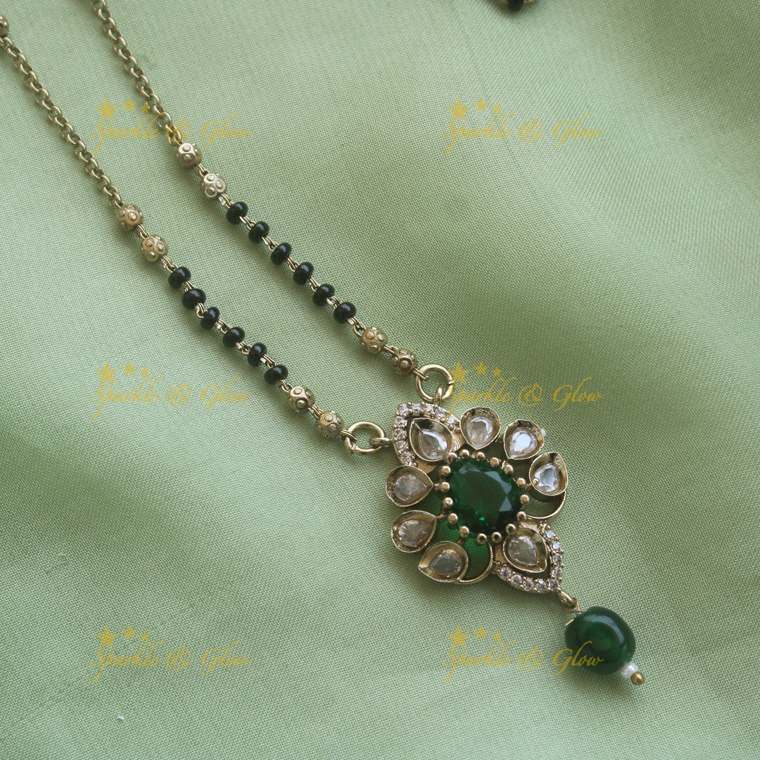 Beautiful Floral design pendant black beads necklace, mangalsutra with green beads and stones