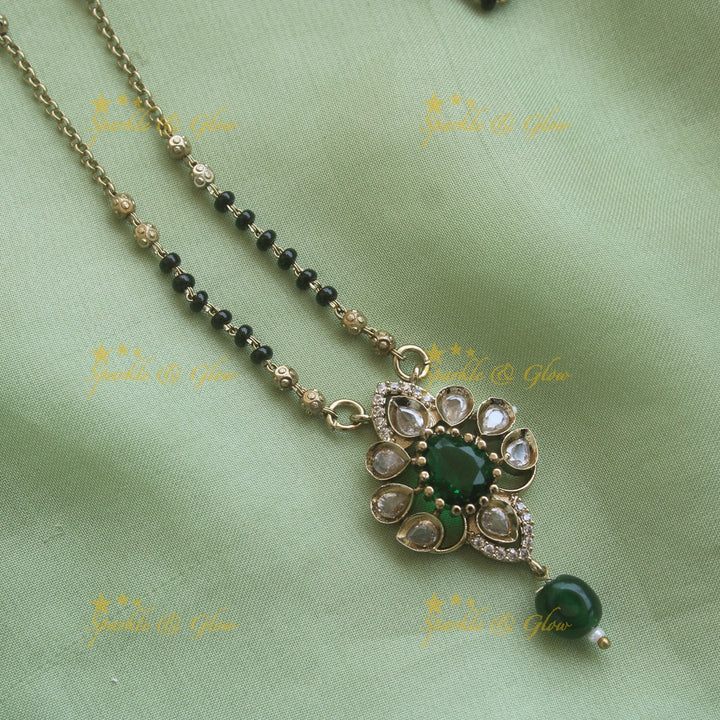 Beautiful Floral design pendant black beads necklace, mangalsutra with green beads and stones