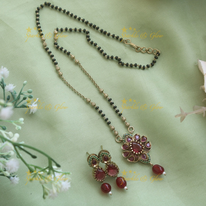 Beautiful Floral design pendant black beads necklace, mangalsutra with Maroon green stones and beads
