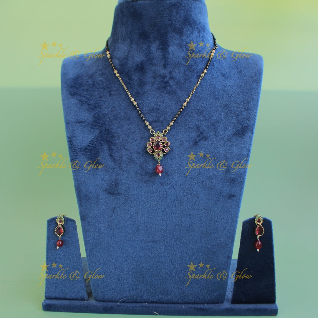 Beautiful Floral design pendant black beads necklace, mangalsutra with Maroon green stones and beads