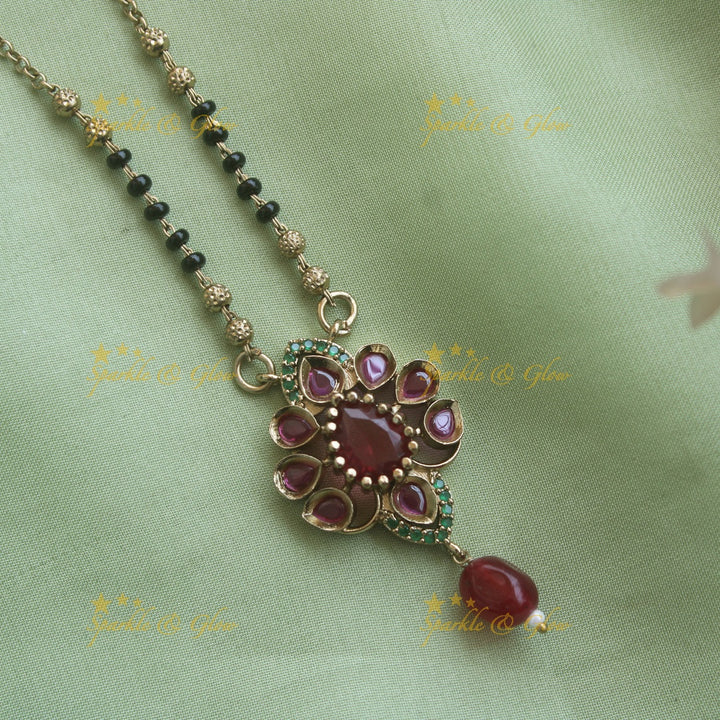 Beautiful Floral design pendant black beads necklace, mangalsutra with Maroon green stones and beads