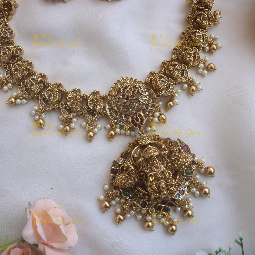Statement Lakshmi peacock carved long necklace with ruby emerald CZ stones pearls and gold beads