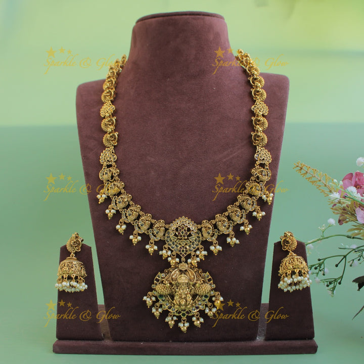 Statement Lakshmi peacock carved long necklace with ruby emerald CZ stones pearls and gold beads