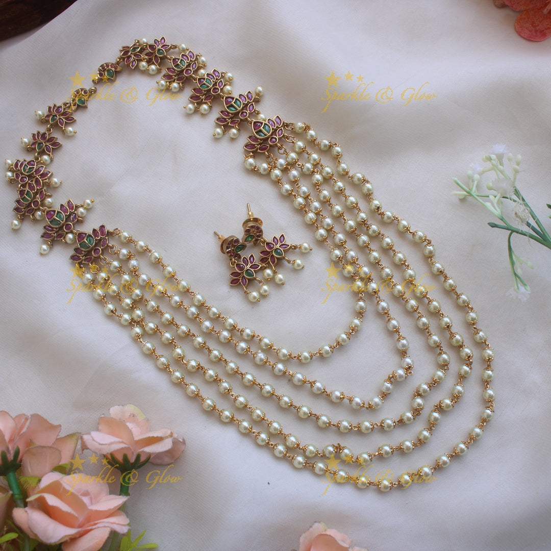 Grand Lotus design multi layer pearl haram with ruby and emerald stones
