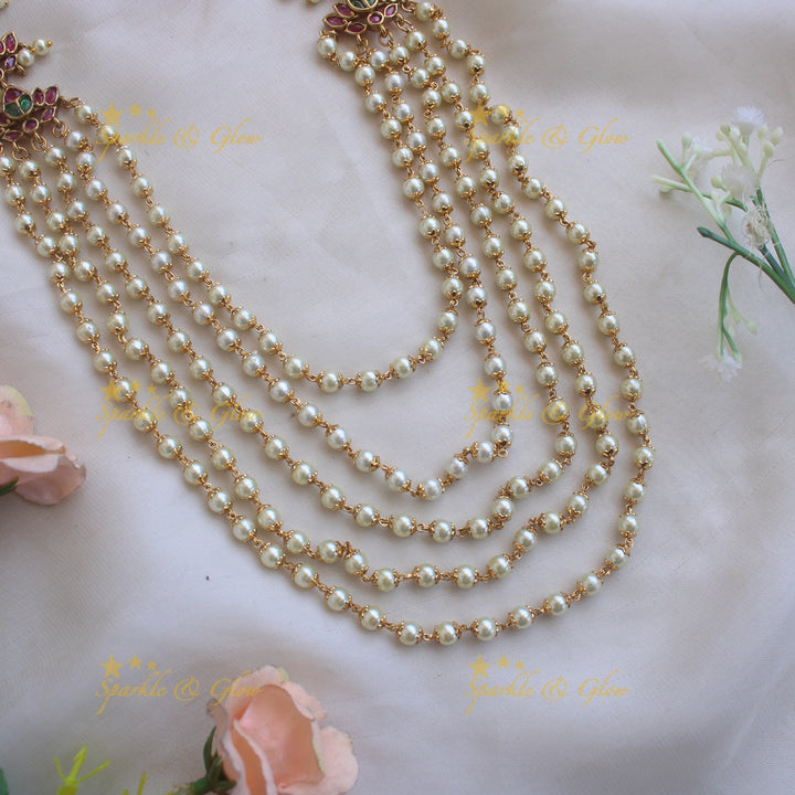 Grand Lotus design multi layer pearl haram with ruby and emerald stones