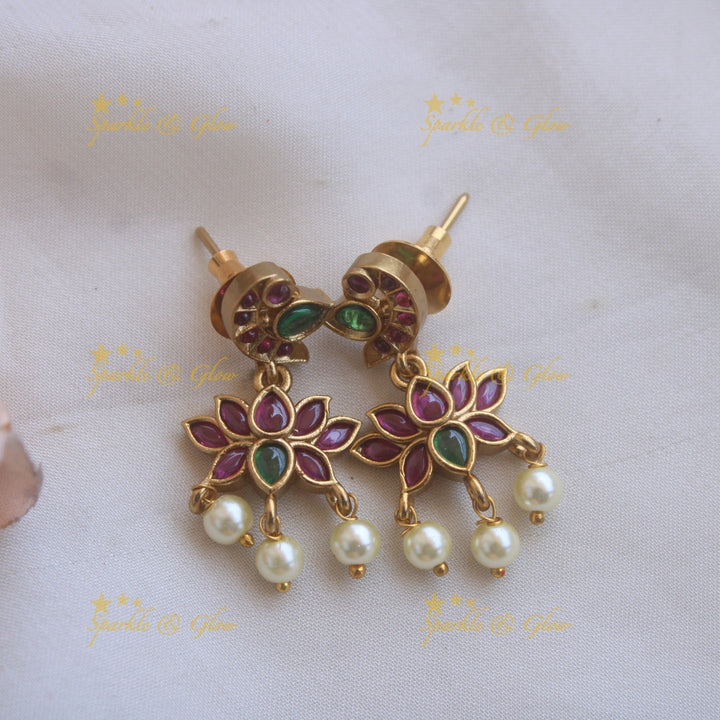 Grand Lotus design multi layer pearl haram with ruby and emerald stones