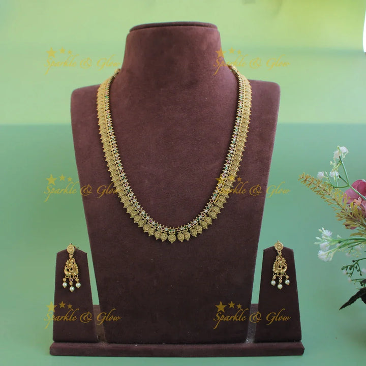 Elegant Premium Matt Lakshmi peacock coin haram with ruby emerald and white stones - multi - Sparkle and Glow