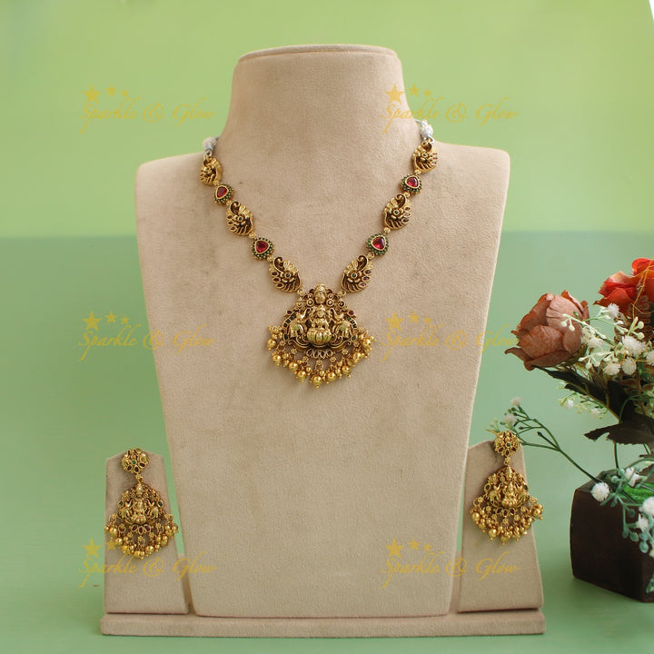 Stunning Lakshmi balaji and elephant carved short necklace with ruby emerald and gold beads