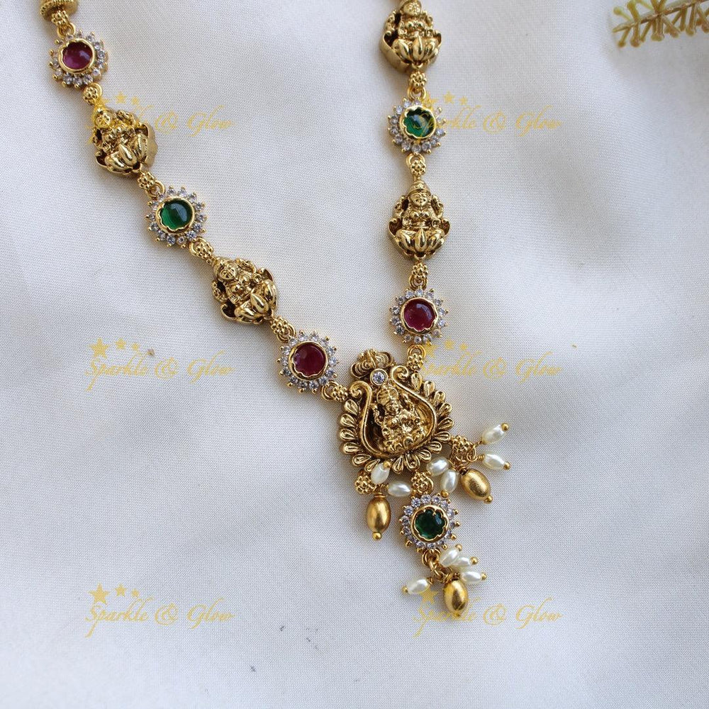 Beautiful Lakshmi floral short necklace with ruby emerald white stones and rice pearls - Multi - Sparkle and Glow