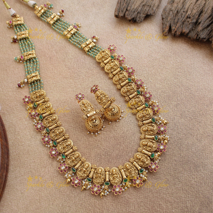 Gorgeous Lakshmi carved floral long necklace with ruby emerald and mint green beads